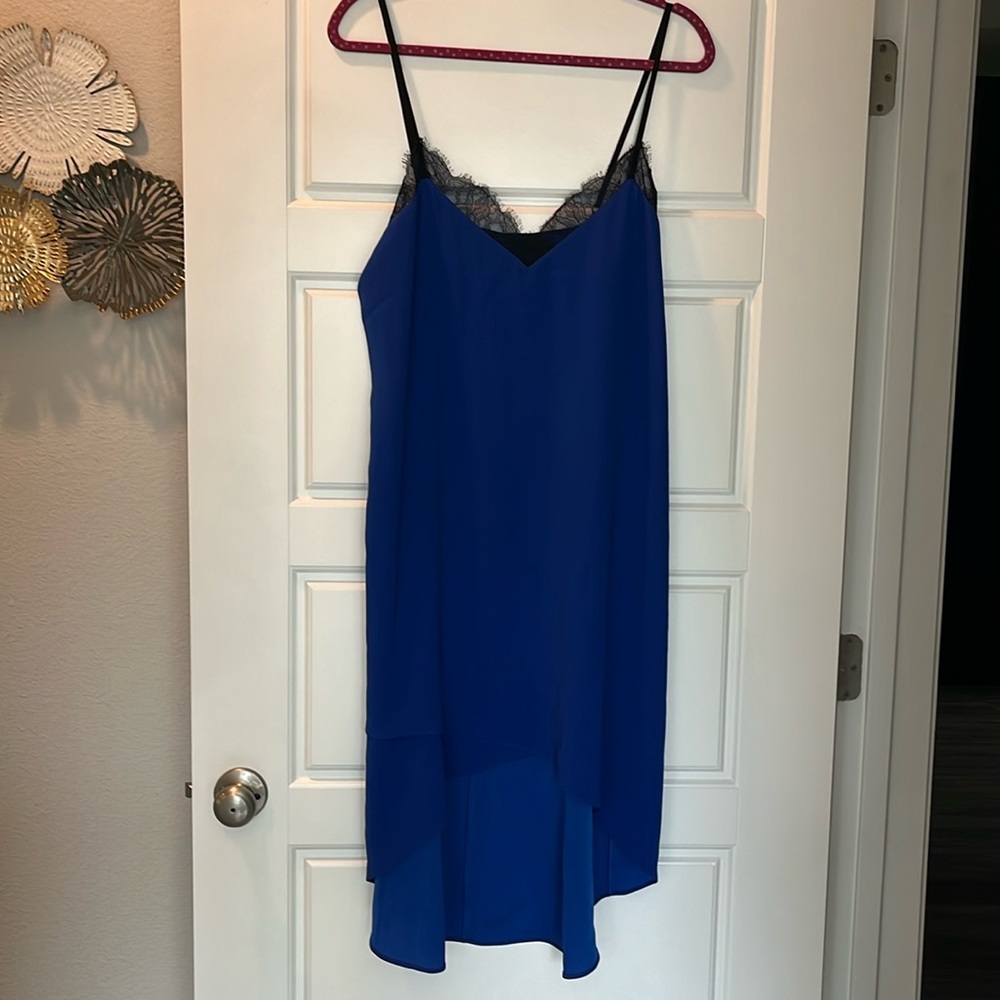 Blue with black lace asymmetrical BCBGMAXAZRIA dress. Medium. New with tags.